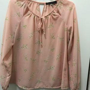Blush colored blouse with flowers